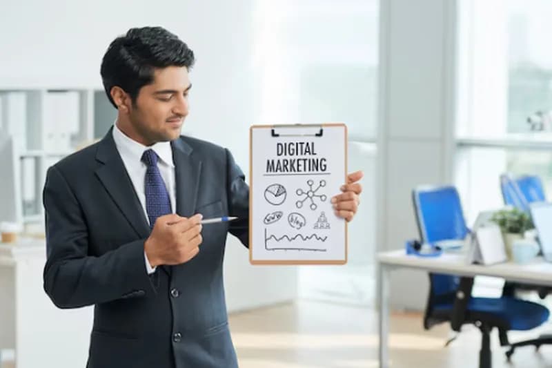 Digital marketing professional working on campaign strategy with analytics on screen