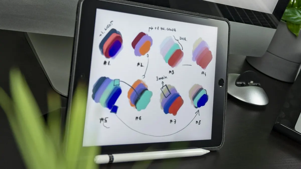 Tablet showing hand-drawn colour swatches being compared for a colour grading look