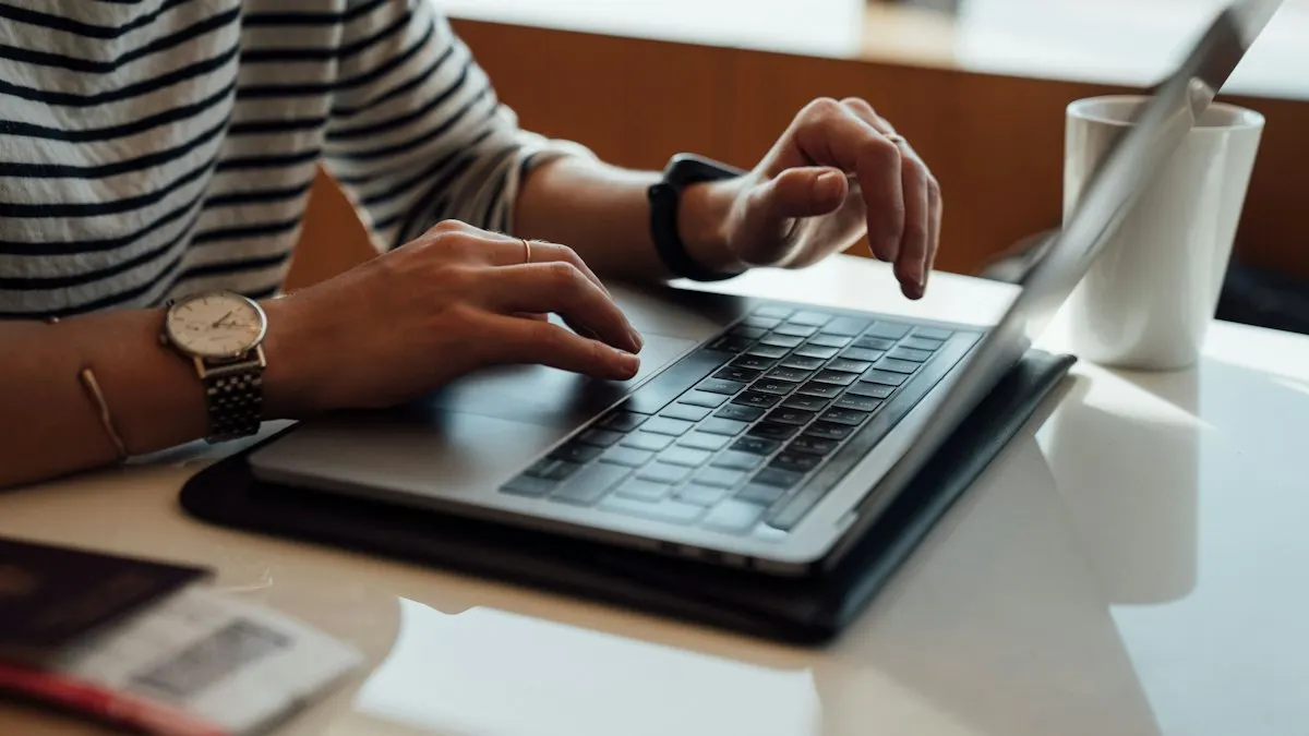 Student working on a laptop beside a coffee mug while practising a digital marketing assignment