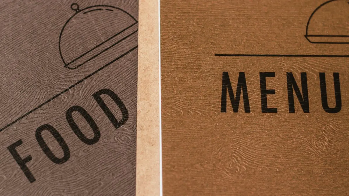 Close view of two restaurant menu covers printed with the words food and menu