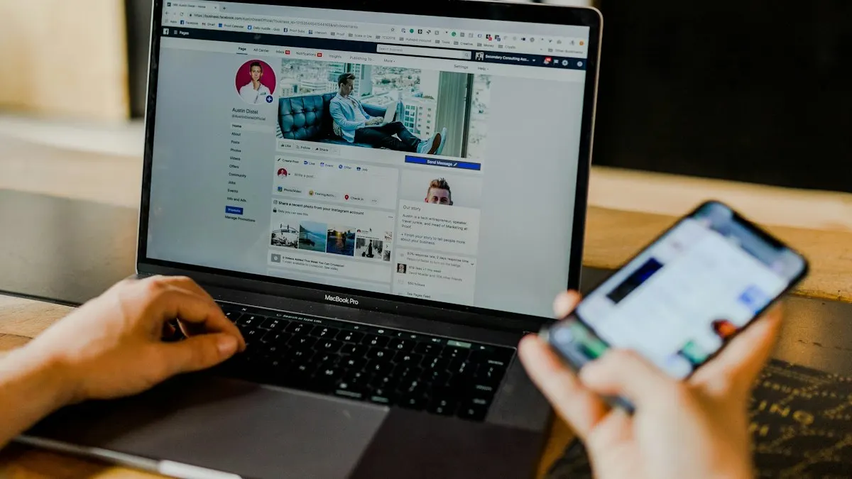 Person checking a social media feed on a phone while working on a laptop