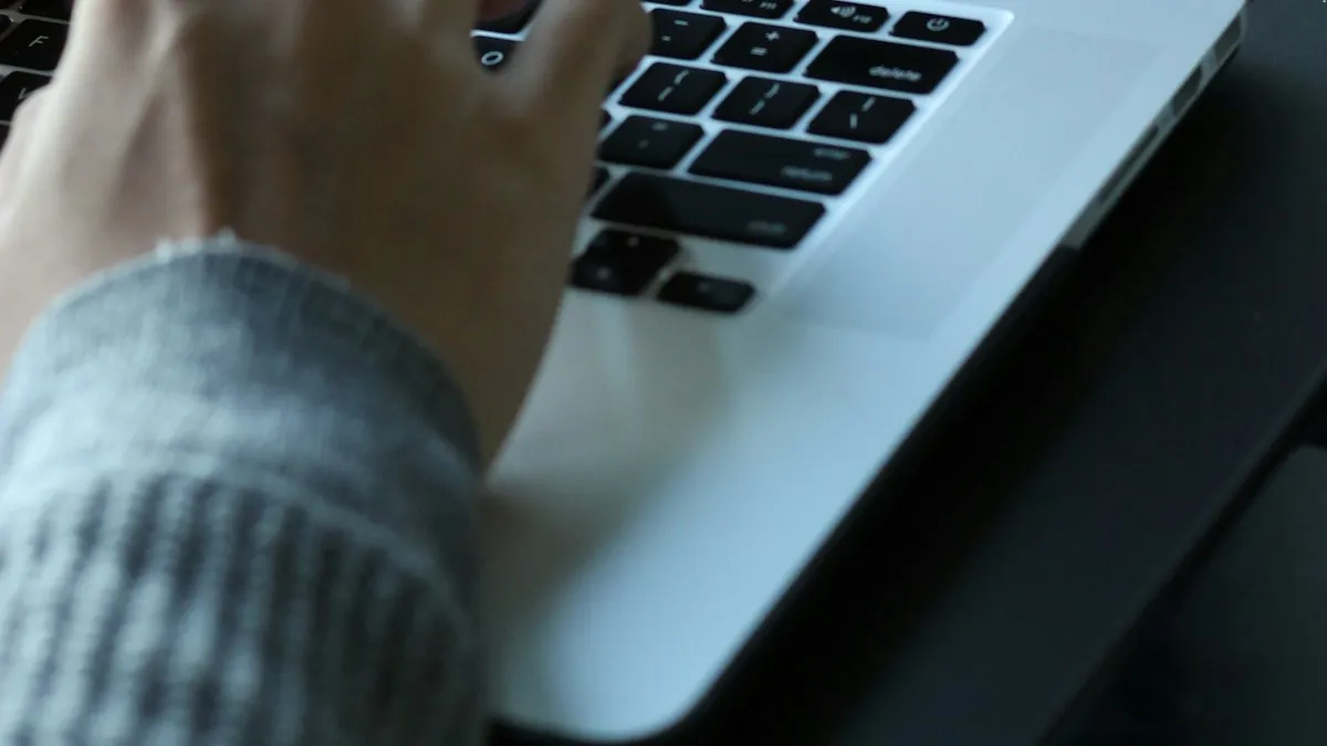 A video editor working on a timeline with headphones on
